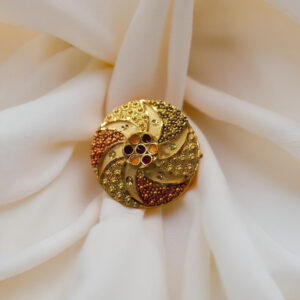 “DivyGold 1 gram gold-polished pinwheel floral statement ring with mixed-tone beadwork on ivory fabric”