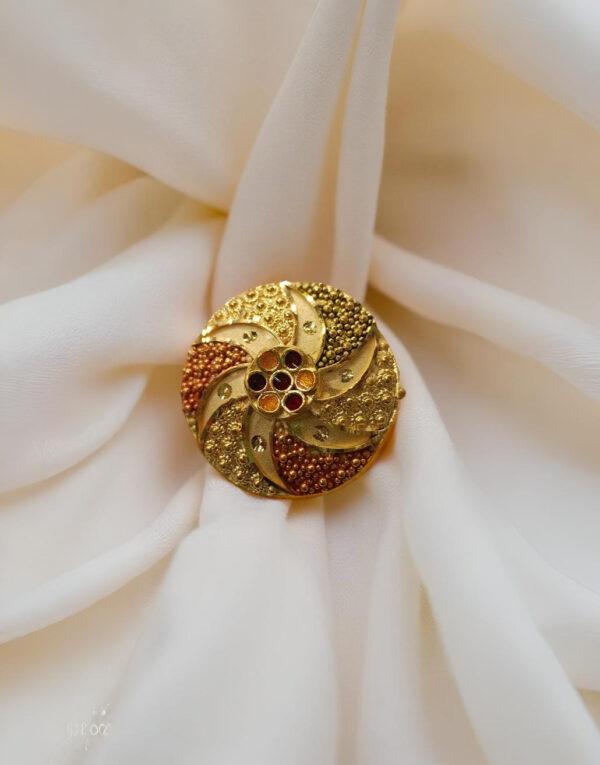 “DivyGold 1 gram gold-polished pinwheel floral statement ring with mixed-tone beadwork on ivory fabric”