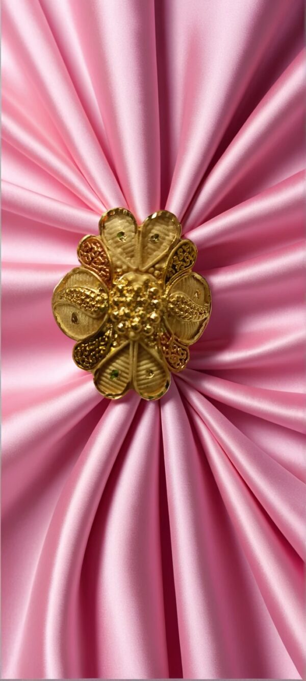 “DivyGold 1 gram gold-plated floral blossom statement ring on pink satin fabric”